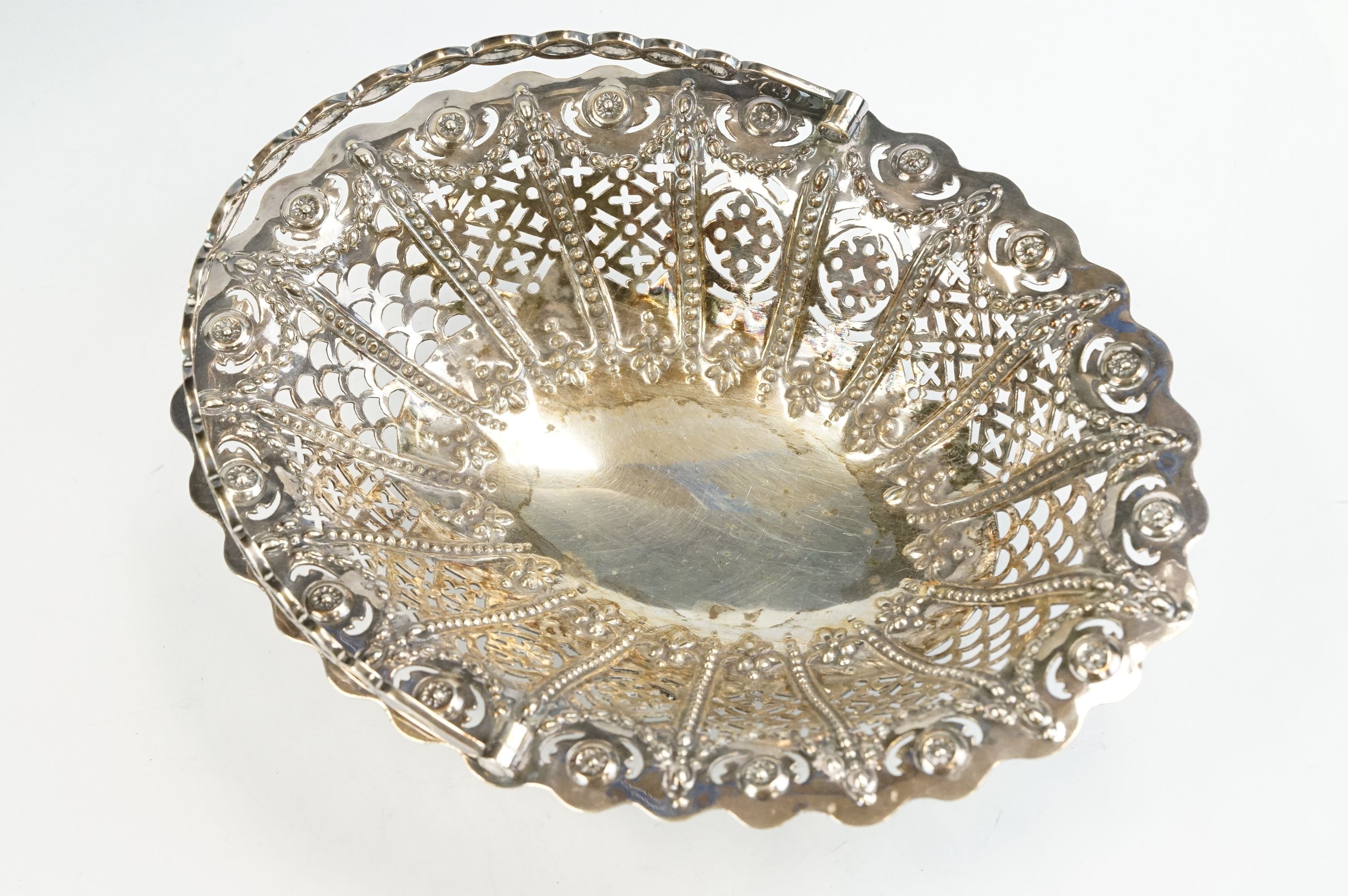 Victorian silver swing handled bon bon dish, pierced body, repoussé foliate and flower head - Image 2 of 6
