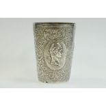 Victorian silver beaker with embossed Roman emperor panels (Nero, Titus and Claudius), on a