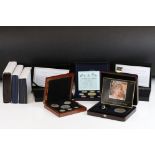 A collection of eight cased coin sets to include the princess Diana 20th anniversary date stamp