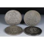 A collection of four British pre decimal silver full crown coins to include 1937, 1935, 1900 and