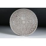 A British King Charles II silver shilling, dated 1676, counter struck with masonic mark to the