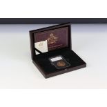 A 2019 British Queen Victoria 22ct gold proof one penny coin, complete with COA, display case and