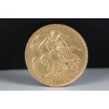 A British King Edward VII gold 1904 full sovereign coin.