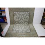 Egyptian New Zealand Wool Cream Ground Rug with green floral pattern, 160cm x 235cm