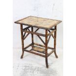 Victorian Aesthetic Movement Bamboo Table with floral and bird pattern decoration to top and shelf