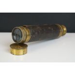 A vintage brass cased three drawer pocket telescope.