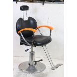 Mid 20th century Rise and Fall Barber's Chair with black faux leather upholstered, chrome orange