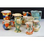 Collection of nine mainly Art Deco Hand Painted Jugs including Crown Devon, Crown Ducal, Burleigh,