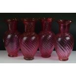 Two Pair of Cranberry Swirling Glass Vases, tallest 34cm high