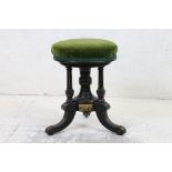 Victorian Aesthetic Movement Ebonised Revolving Piano Stool with green upholstered seat, 35cm
