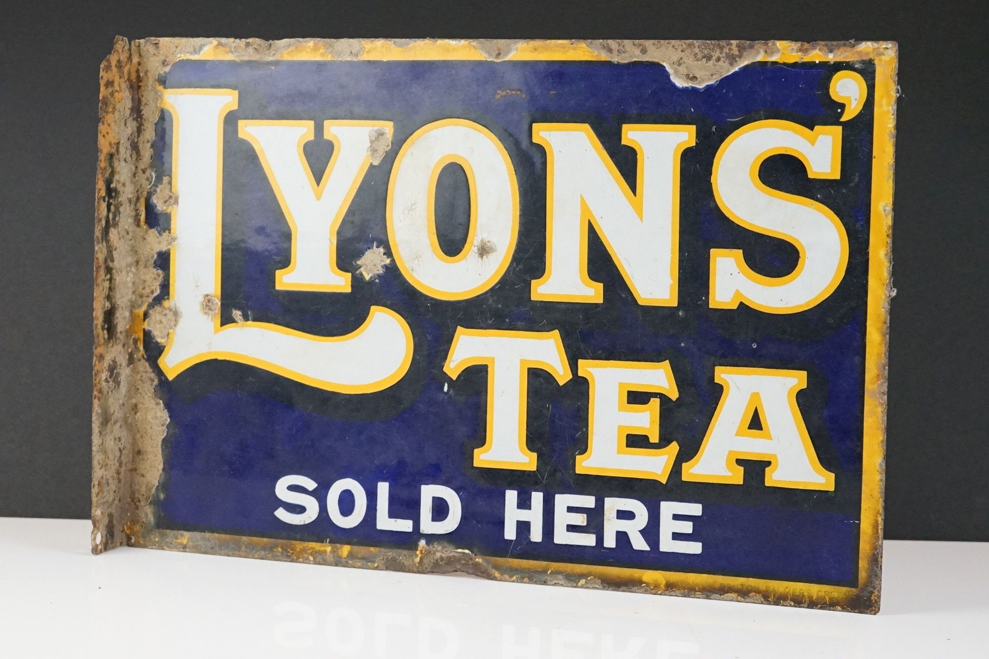 Advertising - Original ' Lyons Tea Sold Here ' double-sided enamel sign, white text on blue ground