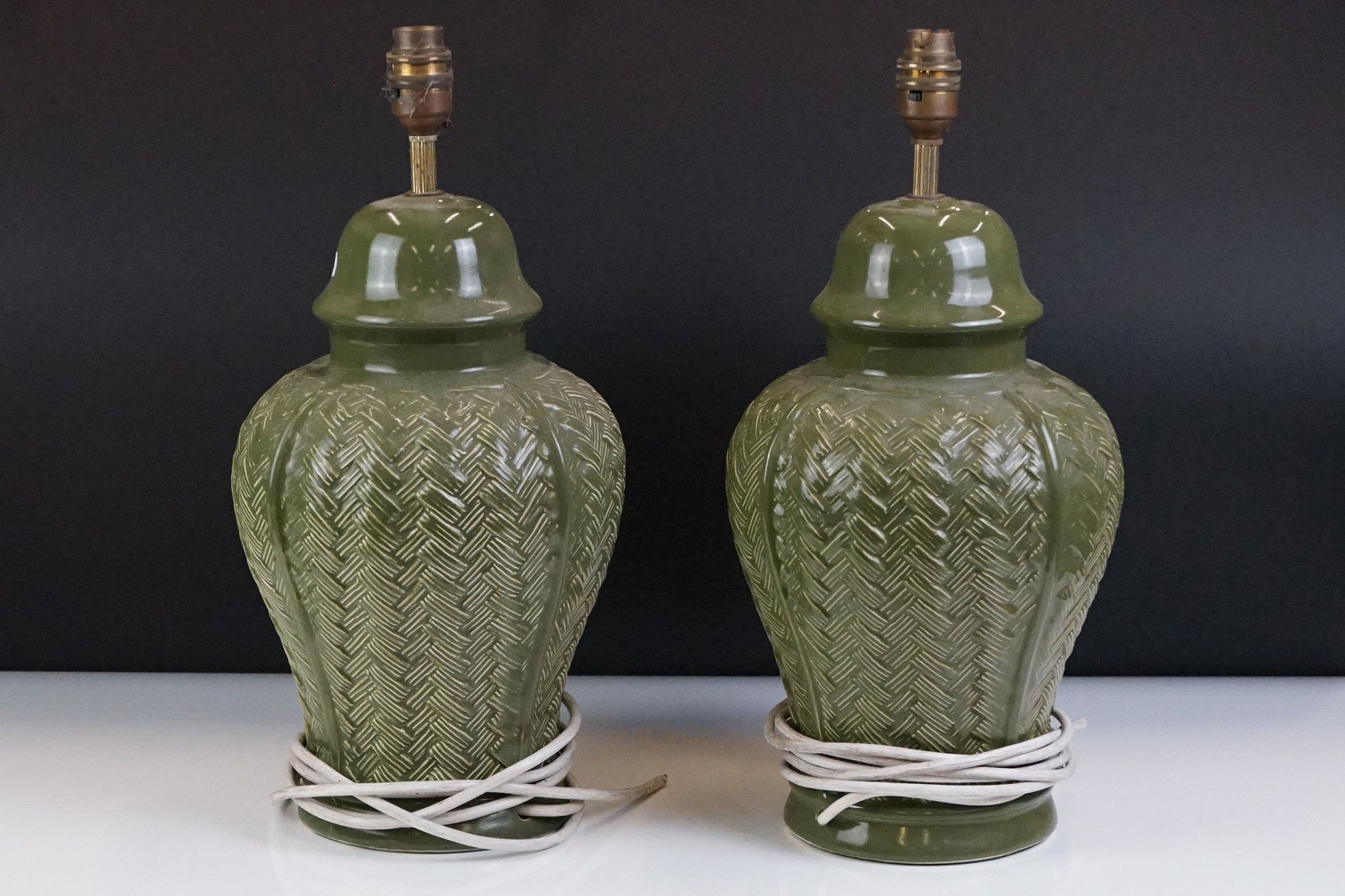 Pair of Green Glazed Baluster-shaped Table Lamps with moulded basket weave pattern, 40cm high with