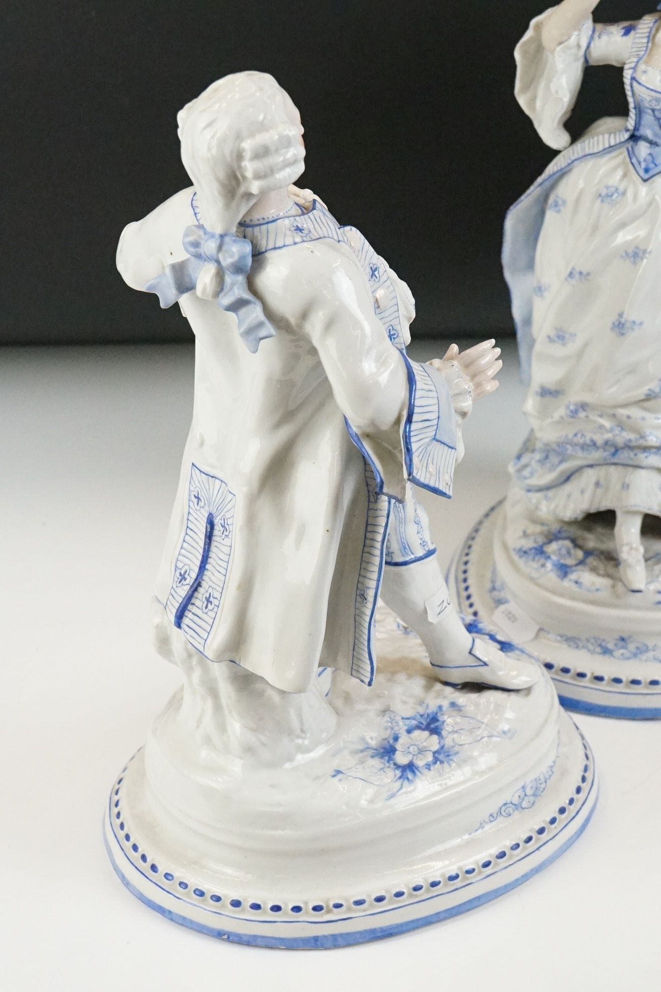 Pair of late 19th Century Continental porcelain figures depicting an 18th century lady and - Image 4 of 12