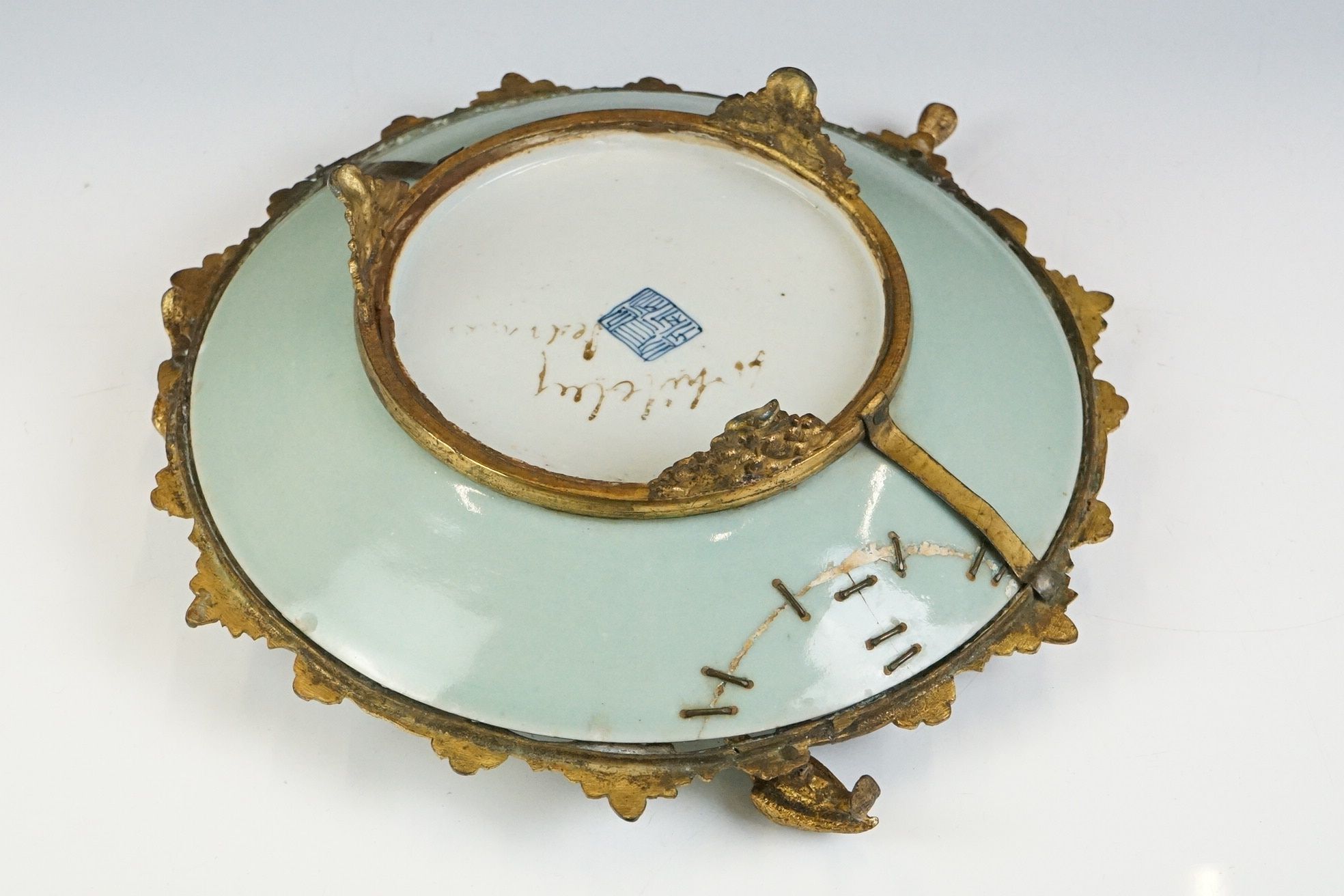 Chinese Famille Rose plate depicting a figural scene, with floral border, in gilt metal mount with - Image 16 of 18