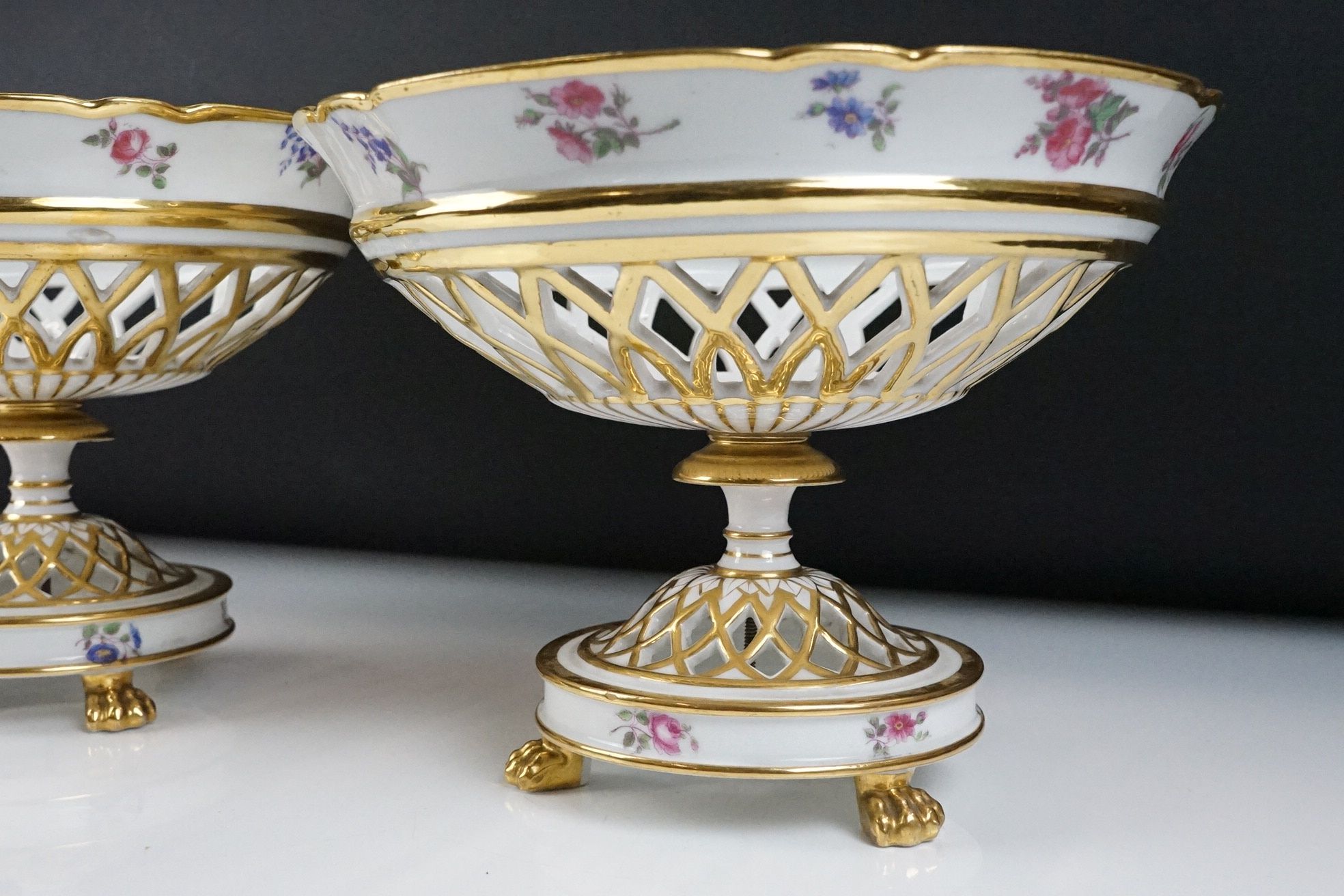 Late 19th / early 20th century pair of Continental porcelain pierced comports, with floral and - Image 5 of 7