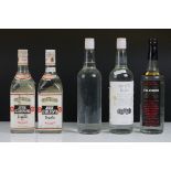 White Rum 2 bottles, Tequilla 2 bottles and Stolichnaya Vodka (leaking) 1 bottle (5 total)