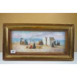 Framed Oil Painting extensive scene of Victorian figures on a beach with huts and distant boats