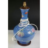 Chinese style Ceramic Bottle-shaped Table Lamp decorated in enamels with flowers on a blue ground,