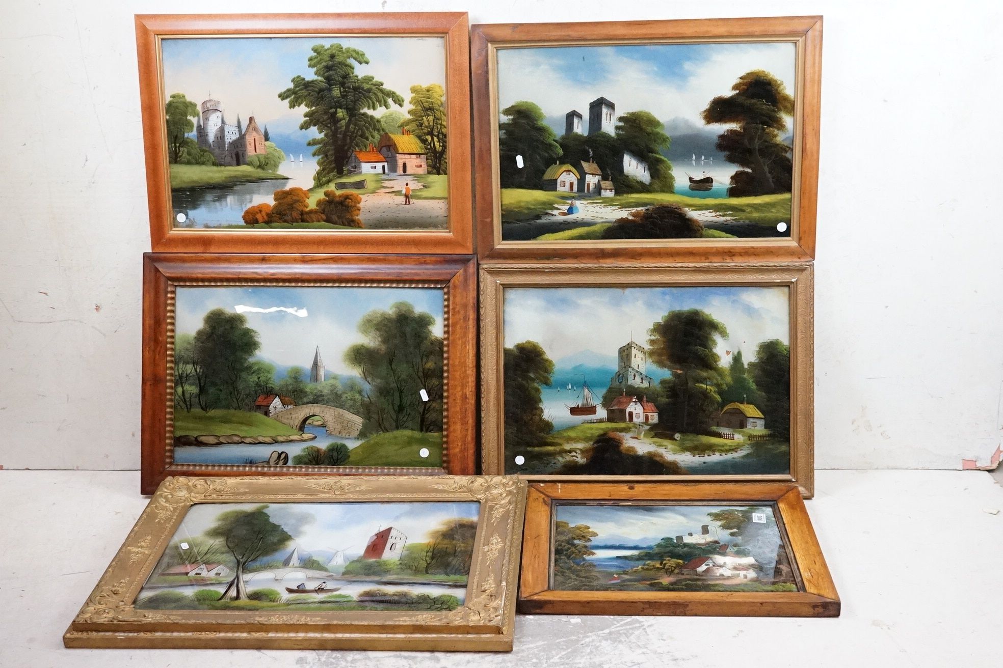 Six Victorian Reverse Painted Glass Landscape Pictures, largest 40cm x 60cm, all framed