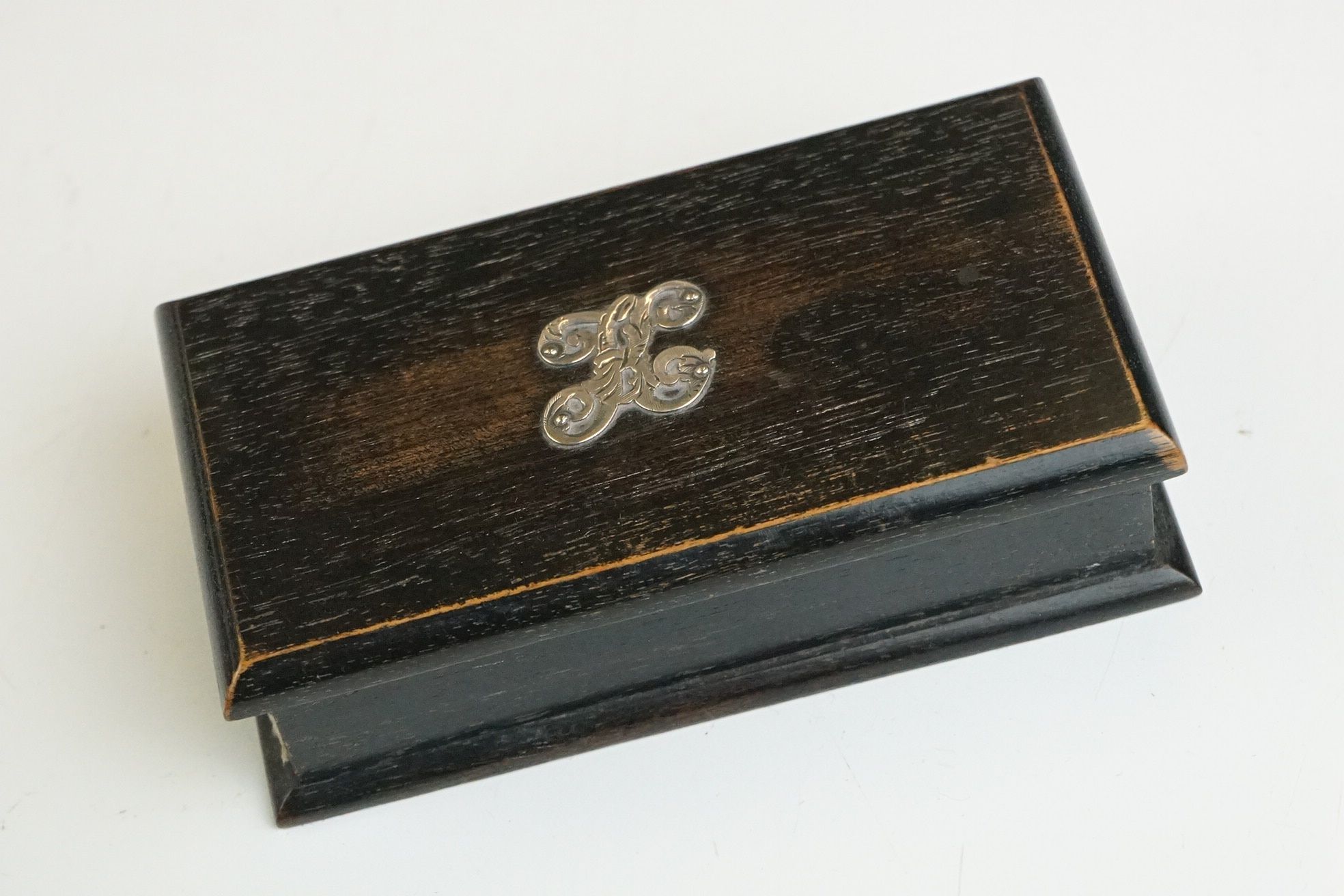 An early 20th century ebony brush set together with a group of other ebony items to include stud box - Image 3 of 7