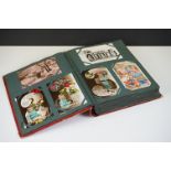An early 20th century postcard album containing a good collection of postcard dating from the