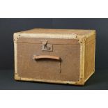 Early 20th Century fabric-covered travel trunk, of rectangular form, with leather carry handle,