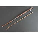 Early 20th Century silver collared whip / riding crop, with white metal woven design pommel and a