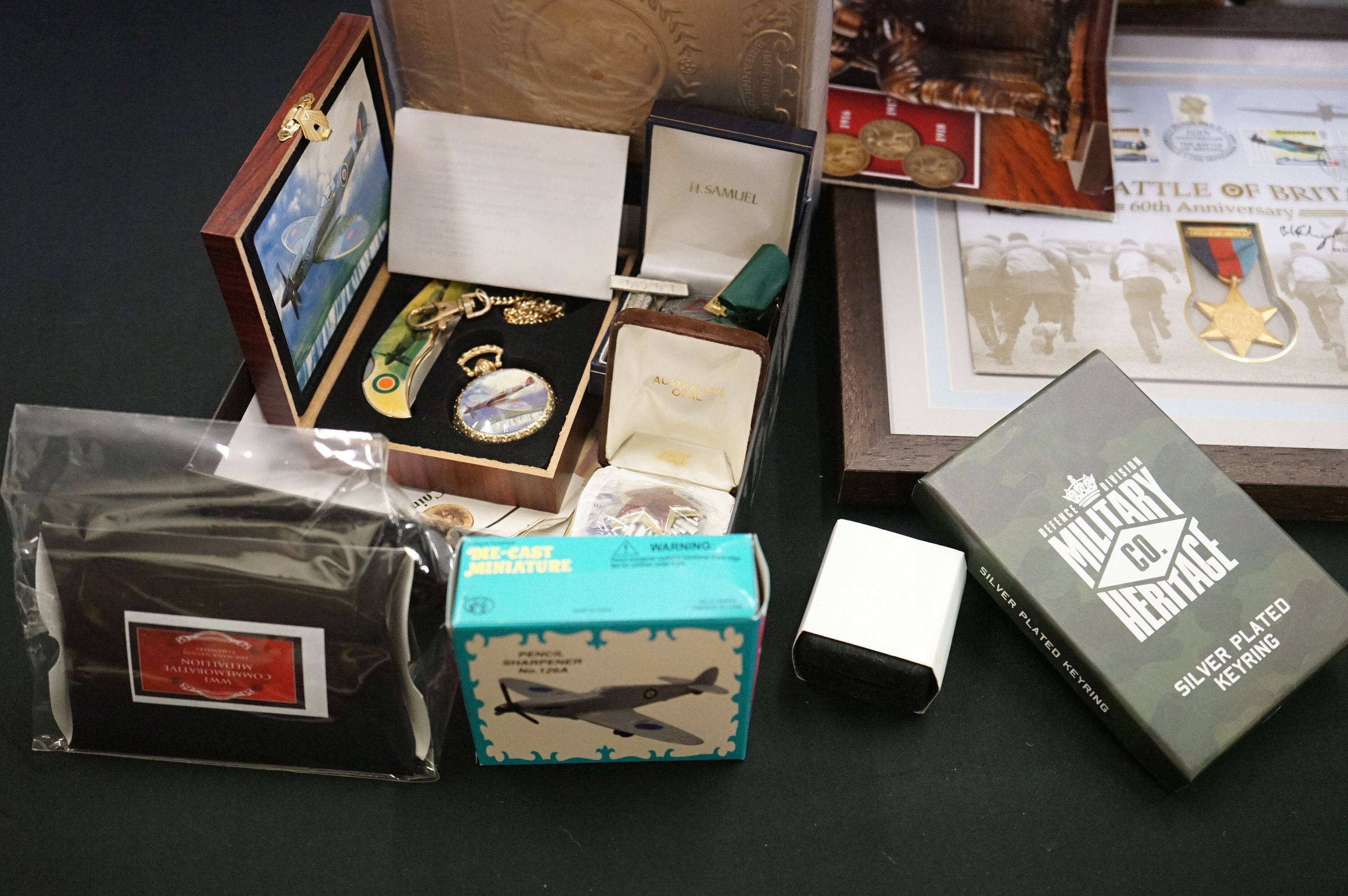 A large group of collectables relating to the military to include coin sets, badges, medals....etc. - Image 3 of 7