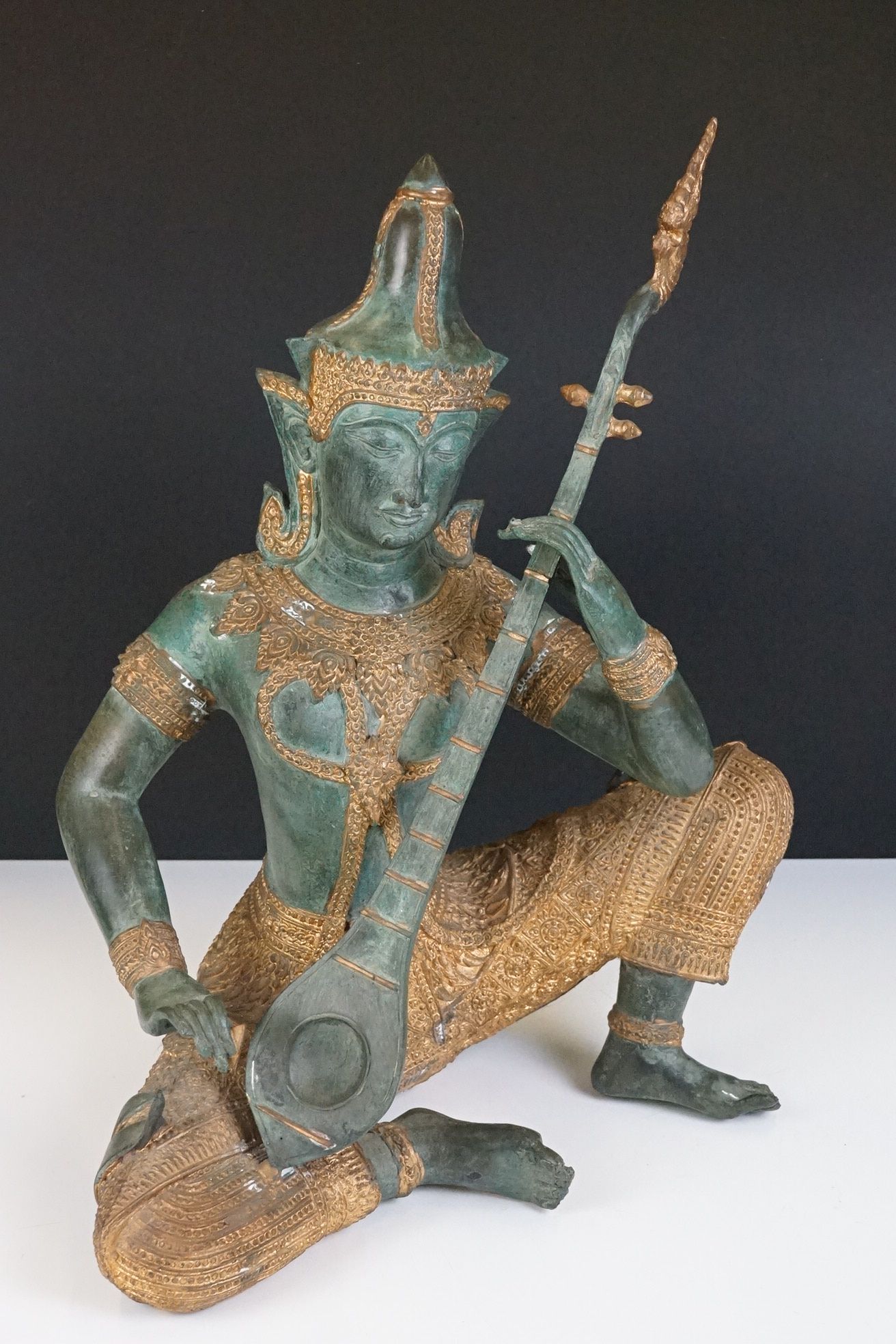 Pair of Thai bronze & gilt sculptures of deities playing musical instruments, one playing a Sueng, - Image 6 of 10