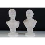 Two Bisque porcelain busts depicting Edward VII and Queen Victoria, raised on pedestal bases,