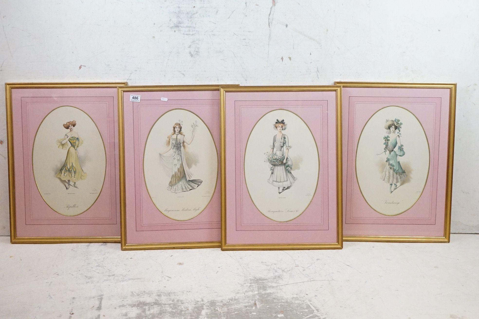 Set of Four French Oval Fashion Prints, 42cm x 28cm, in matching pink mounts, framed and glazed