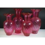 Two Pairs of Swirling Cranberry Glass Vases with wavy frilled rims, tallest pair 33cm