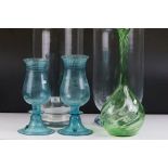 Pair of Pale Blue Glass Lamps (lacking fittings), 32cm high together with a Green Glass Bottle Vase,