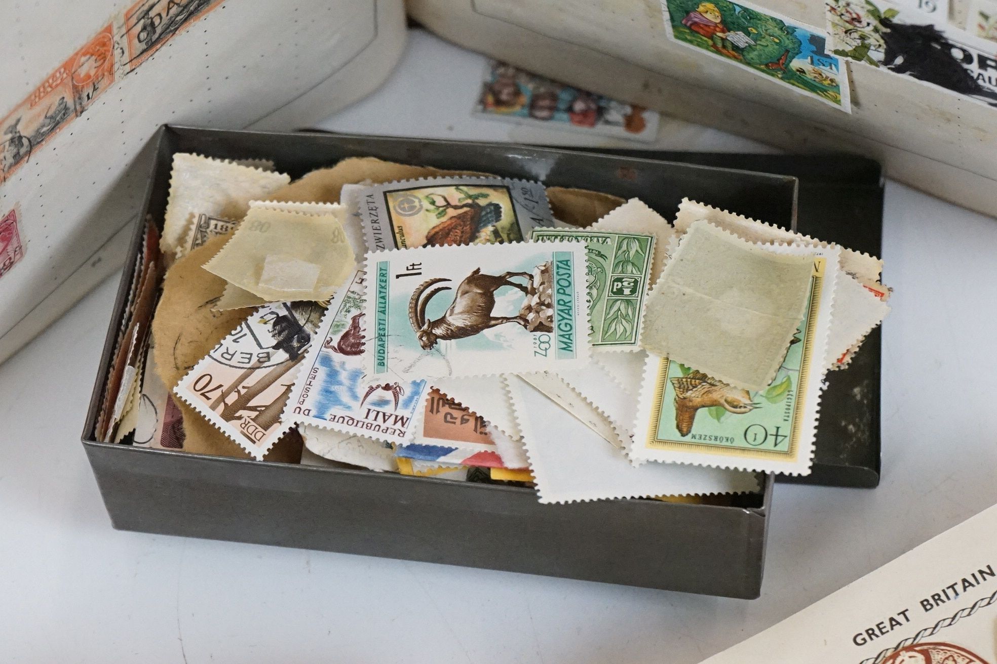 A small collection of British and world stamps contained within three albums together with a small - Image 3 of 7