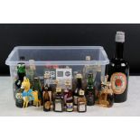 A collection of miniature bottles to include Whisky and rum together with a babycham model.