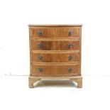 Walnut Bow Front Chest of Four Long Drawers in the George III manner, 63cm wide x 76cm high