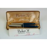 A vintage Parker 51 fountain pen and propelling pencil set within original gift box.