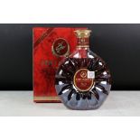 A bottle of Remy Martin fine champagne cognac XO Special, sealed bottle in box.