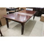 Late Victorian Mahogany Wind-out Dining Table with two additional leaves raised on turned ringed and