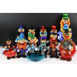 17 Murano glass clown figures, featuring clown with ukulele, basket-form and dish-form examples (