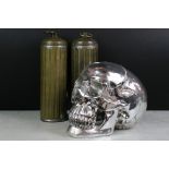 Model of a Silvered Skull together with Two Brass Hot Water Bottles