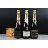 A collection of four bottles of Champagne to include Moet & Chandon, Louis Daumont, Louvel