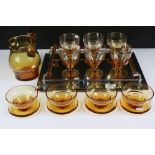 Stuart amber glass lemonade set with part-ribbed bowl design (comprising 6 glasses and a jug -