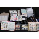 A large collection of mainly British stamps and first day covers, most contained within albums