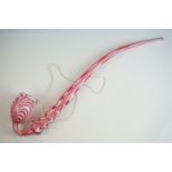 Large Nailsea red and white glass 'bubble' pipe, swirl-effect design, approx 49cm long