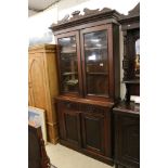 Victorian Mahogany Glazed Bookcase, the upper section with two glazed doors opening to three