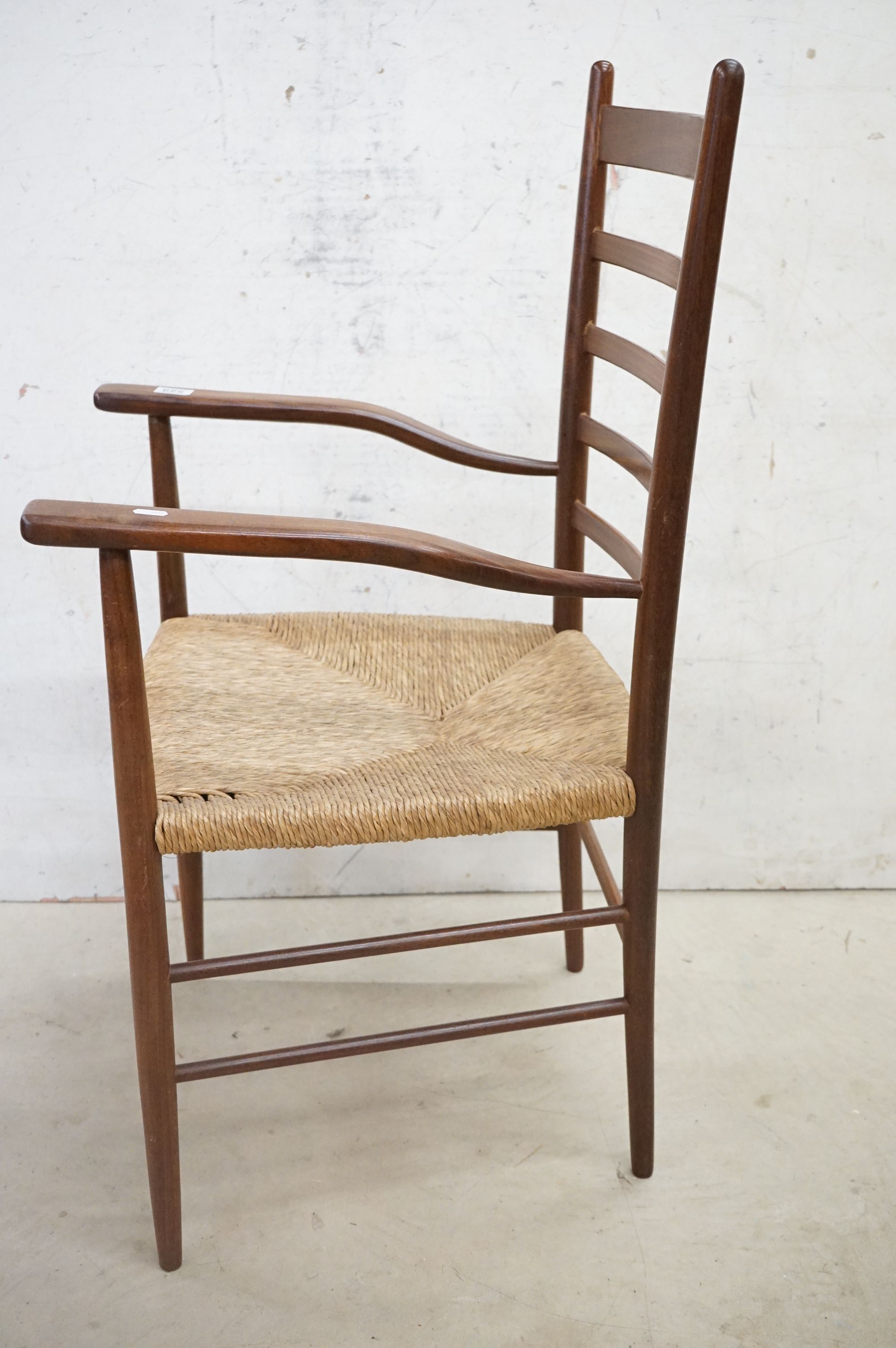 In the manner of Scadart, Pair of Mid century Retro Teak Ladder Back Elbow Chairs with rush seats, - Image 9 of 11