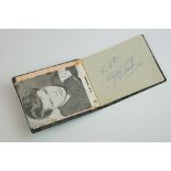 A vintage autograph album containing a quantity of famous autographs to include Liberace, Cliff