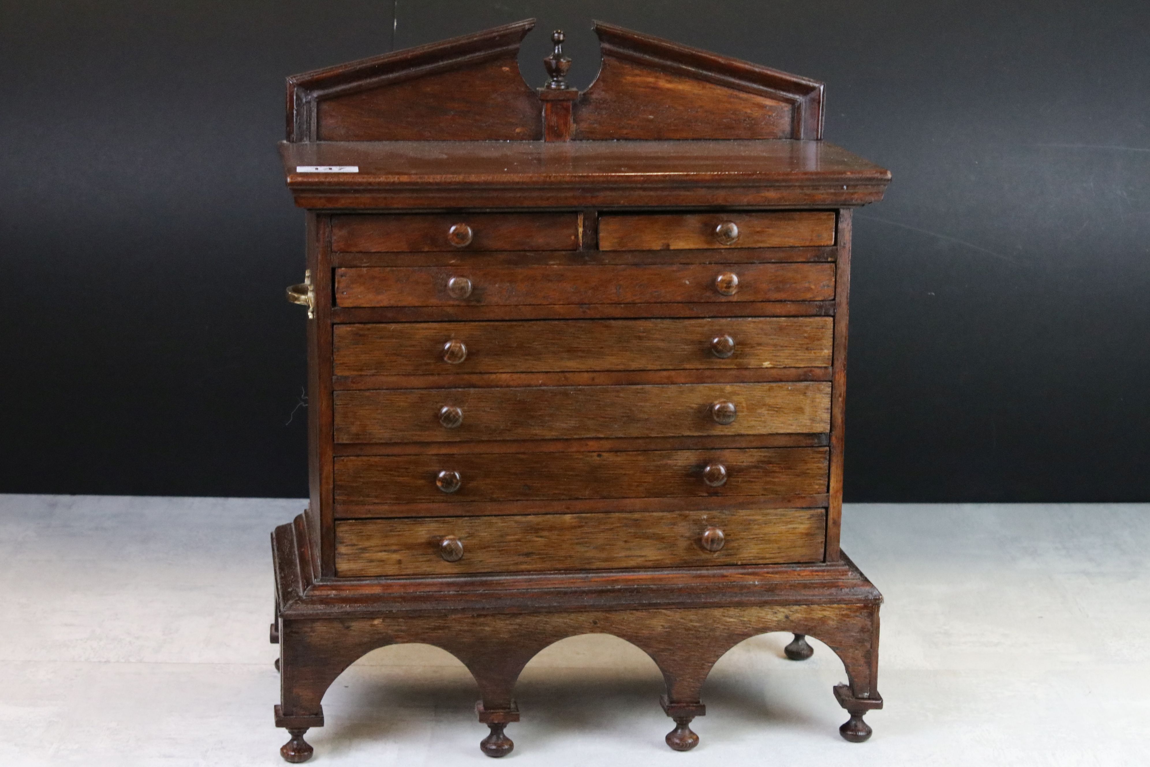 Hardwood Table Top Collector's Cabinet in the form of an 18th century Chest of two short over five
