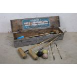 A Jaques garden croquet set in original wooden case.